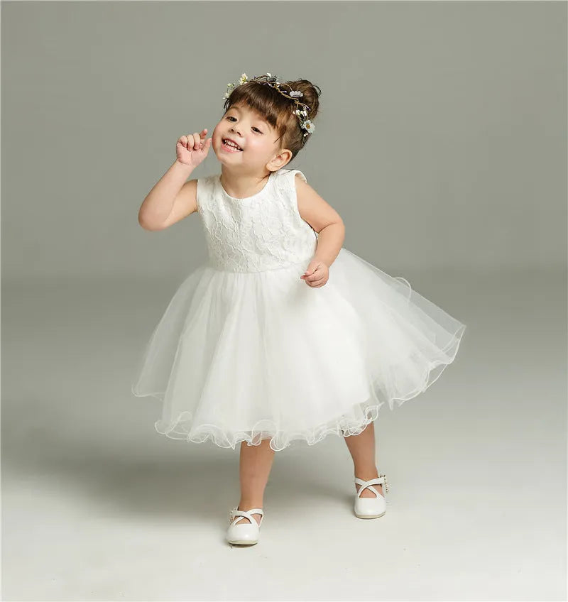 Baby girl fluffy dress two-piece set in beige with soft fabric, displayed on child-sized mannequin