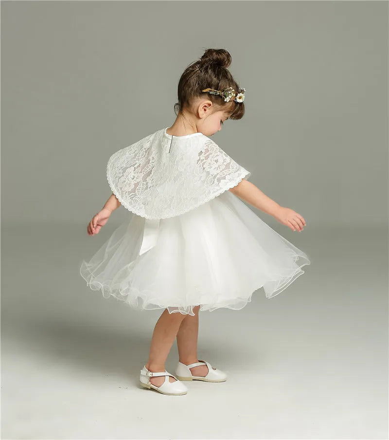 Baby girl fluffy dress two-piece set in beige with soft fabric, displayed on child-sized mannequin