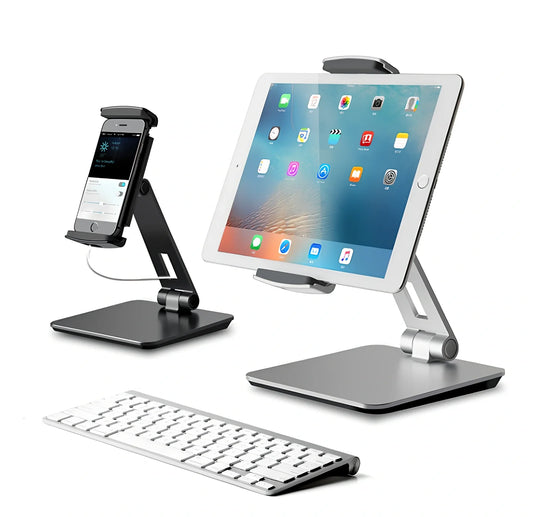 Silver aluminium folding phone tablet holder showing 360-degree rotation mechanism and silicone anti-slip pads