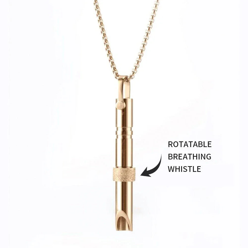 Therapeutic stainless steel breathing pendant with spinner mechanism and Braille text, designed for natural anxiety relief