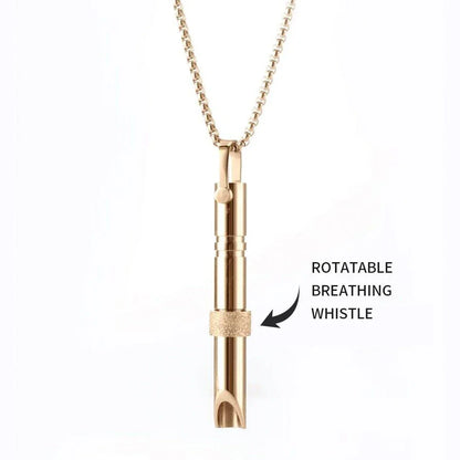 Therapeutic stainless steel breathing pendant with spinner mechanism and Braille text, designed for natural anxiety relief