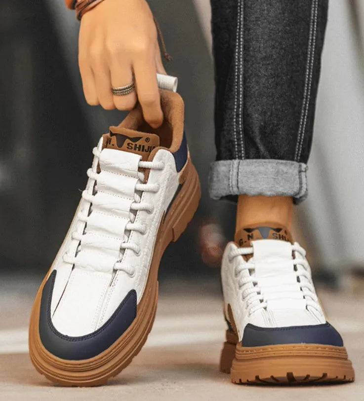 Black and white platform sneakers with thick rubber soles and microfiber leather insoles