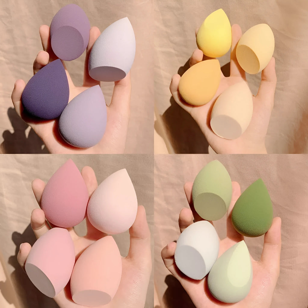 Makeup sponge egg box with four 6cm synthetic beauty sponges in grape, mango, mint, and peach colours