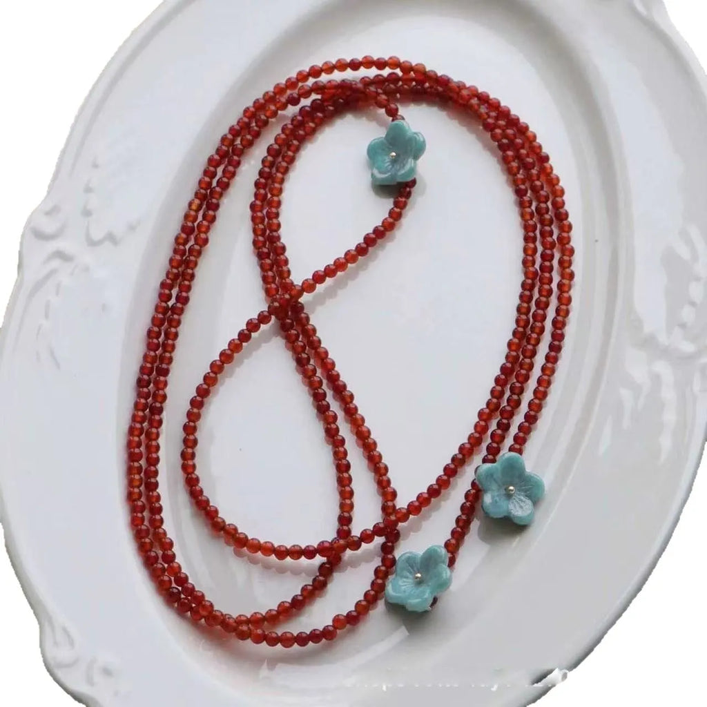Red agate beaded necklace with acrylic geometric pendant and regular chain