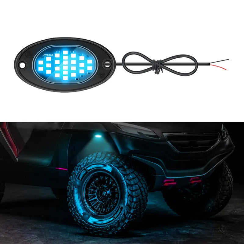 12V car LED chassis ambience light in ABS housing with five colour options on a dark vehicle underside
