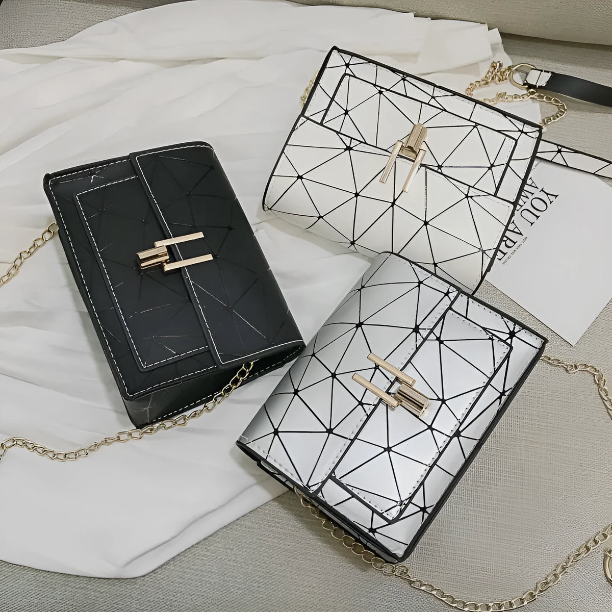 Geometric rhombic square PU cross body bag with chain handle, available in light grey