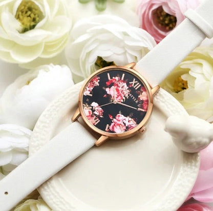 Rose gold women's watch with leather strap and love heart design