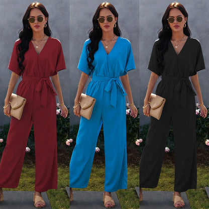 Women's V-neck tie waist jumpsuit in black, dark red, and sky blue