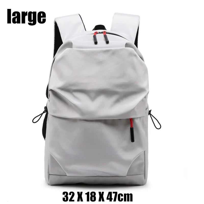 Durable nylon backpack in black and light grey with adjustable straps