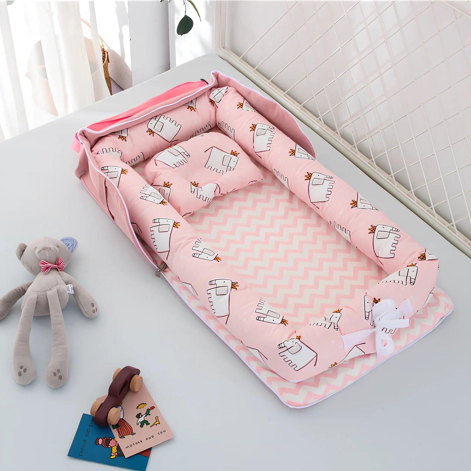 Foldable cotton portable baby crib in Animal World Blue, 90x50 cm with pillow and strap, weighing 1.3 kg