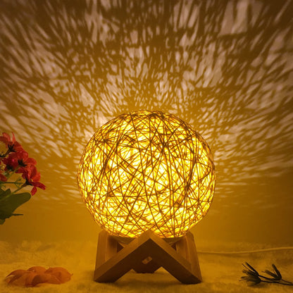 LED rattan table lamp with hand-knit lampshade in various colours