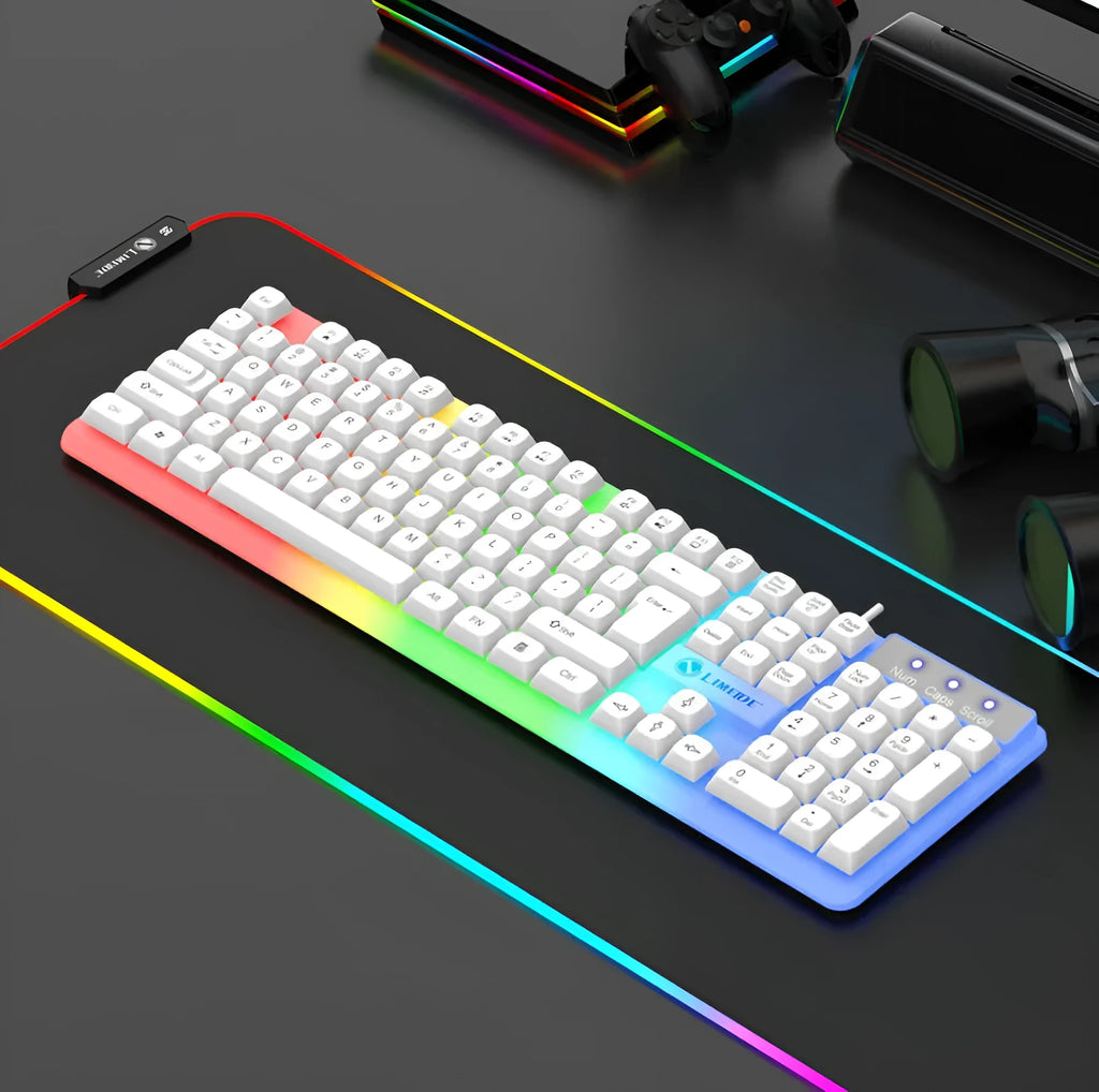 TX35 mechanical feeling keyboard in white and black rainbow colour options next to a laptop.