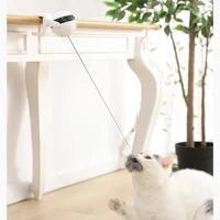 Electronic motion cat toy with real fur ball for interactive play