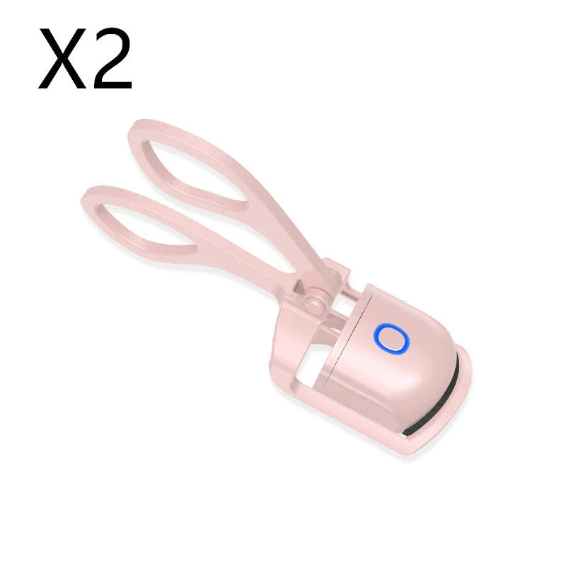 Rechargeable electric heated eyelash curler with temperature control settings, soft silicone pad, and compact, portable design for salon-quality lashes anytime, anywhere