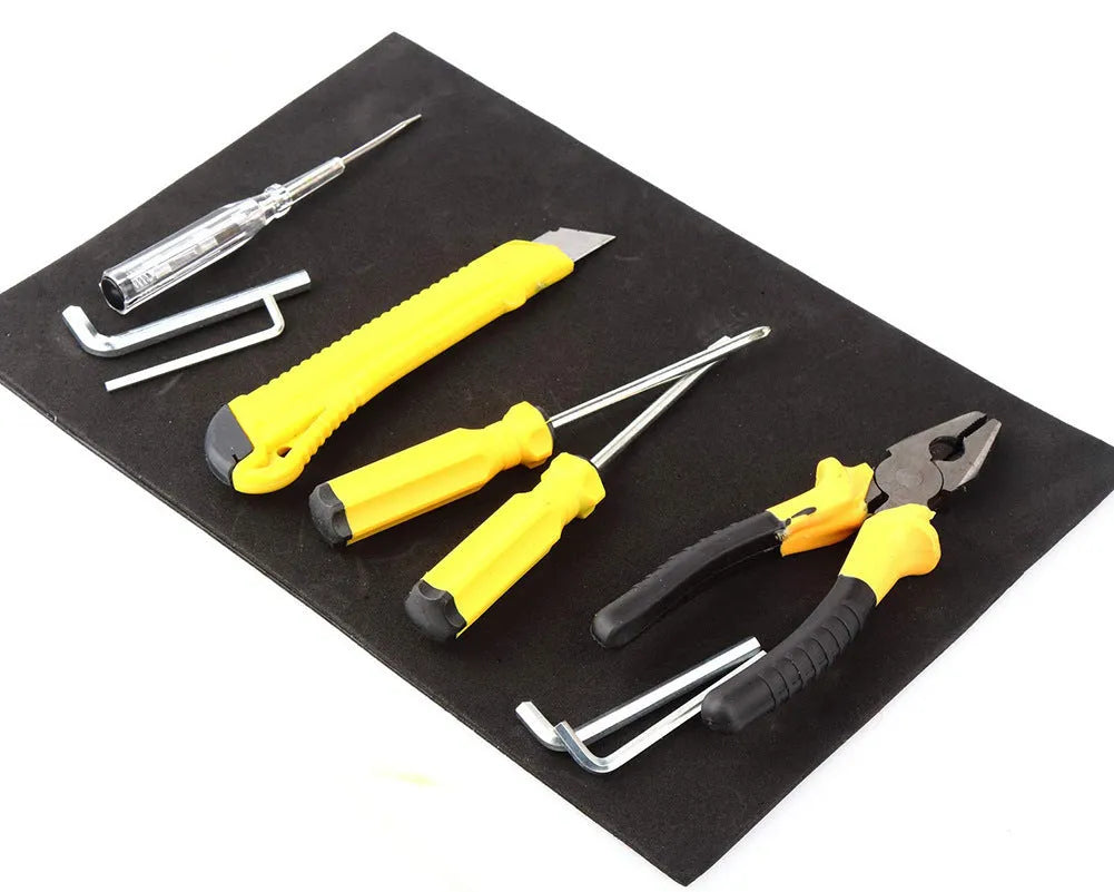 Magnetic pad 300x200x3mm in black, holding metal tools on a car bonnet