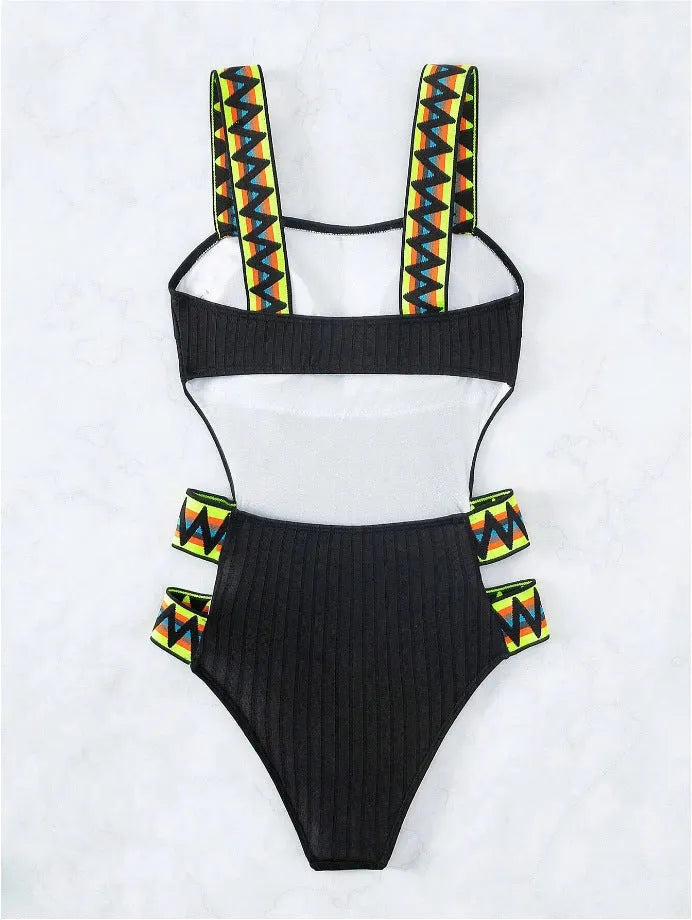 Women's solid colour one-piece swimsuit in black or orange