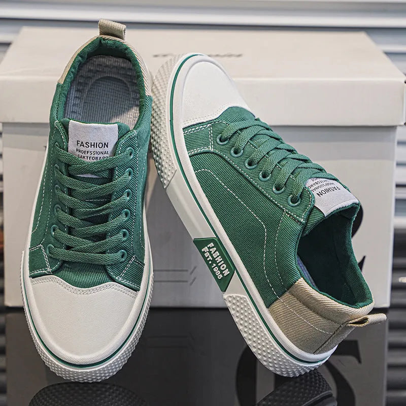 Men's blue canvas casual shoes with round toe and lace-up front, showing PVC sole detail