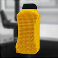 3-in-1 silicone sponge scrubber with built-in soap dispenser, nylon scraper, and squeegee on kitchen counter