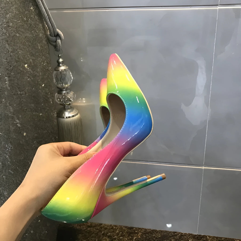 Rainbow patent leather women's ultra-high heel shoes with pointed toe and thin heel.