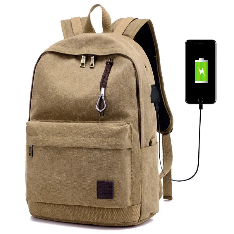 Canvas backpack with USB charging port in grey colour, showing front compartment and shoulder straps.