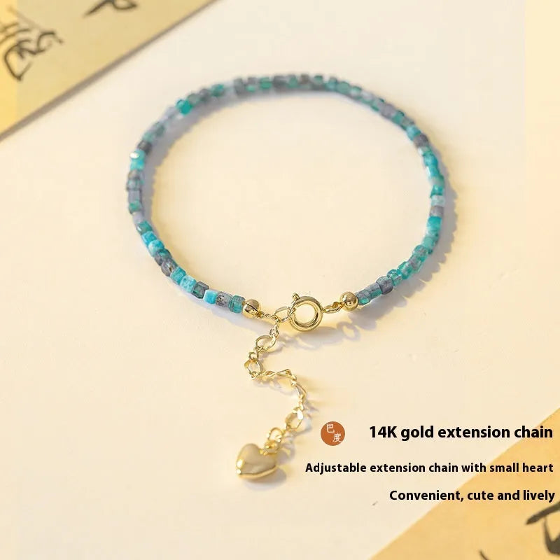 Adjustable women's bracelet with natural blue apatite crystal diamond-shaped beads