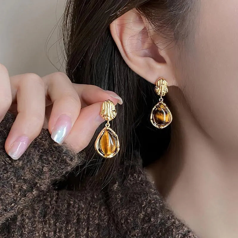Handmade women's geometric tassel earrings in three colour styles: Maillard blooming, French irregular Amber, and water drop Tigereye