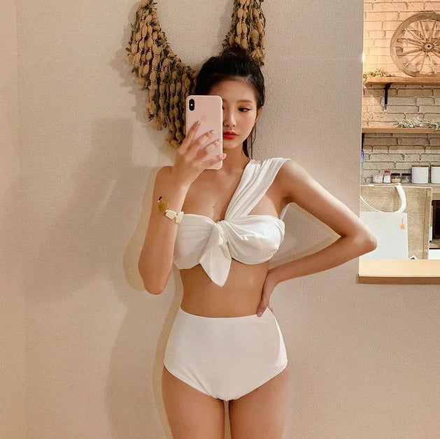 Women's one-shoulder swim bikini in black with high-waist design and split styling