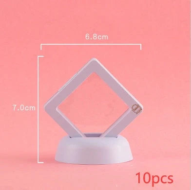 3D floating jewelry display stand showcasing earrings and coins in mid-air