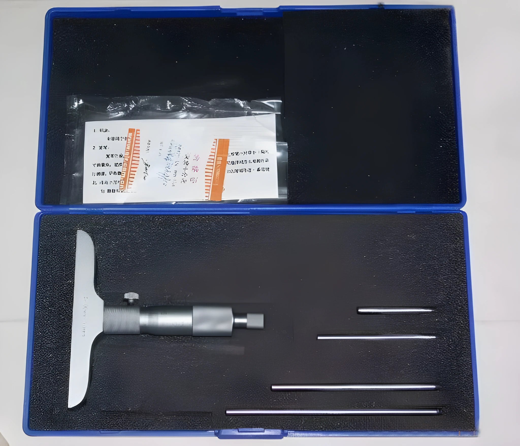 Precision depth micrometer tool with 0-100 mm range and 0.01 micrometre resolution.