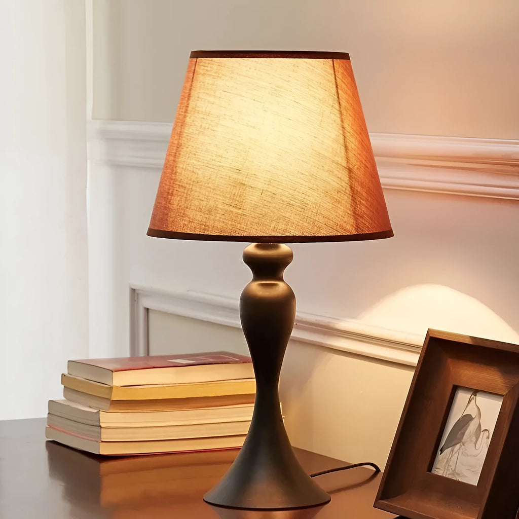 Retro alloy LED table lamp with American design on wooden table