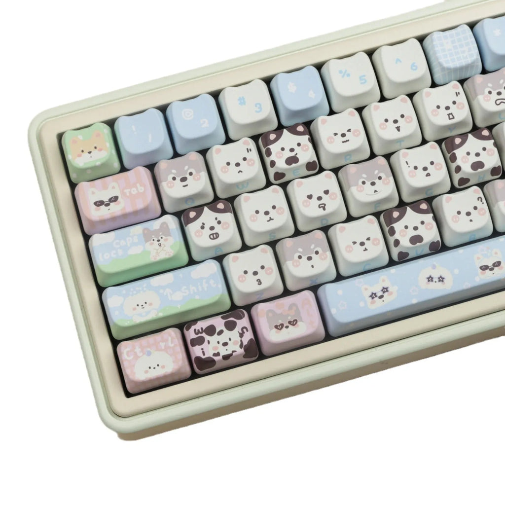 PBT sublimation keycap set showing colourful cat and puppy designs for mechanical keyboards