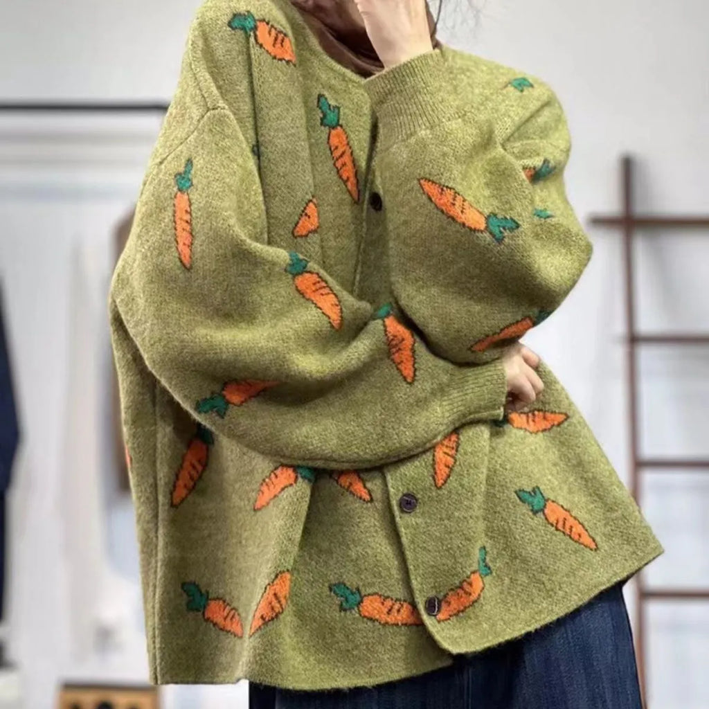 Loose grey cardigan with artistic multi-colour print, round neck, and regular sleeves.