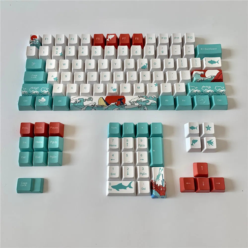 Coral Sea themed PBT plastic keycap set for mechanical keyboards, showing 104 colourful keys.