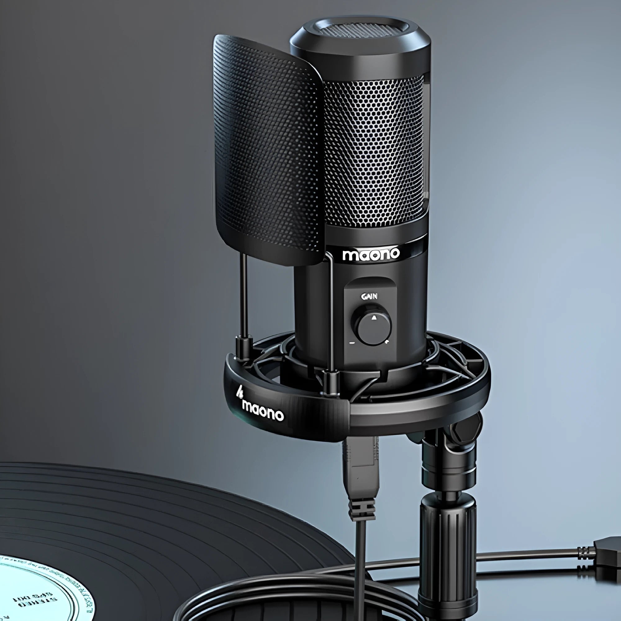 USB condenser microphone on a tripod with shock mount and data cable for computer and mobile recording