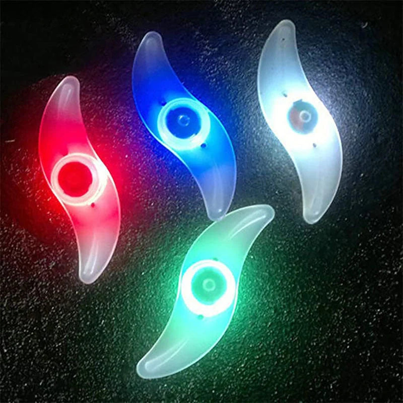 LED bicycle spoke lights attached to bike wheel, showcasing visibility and style options