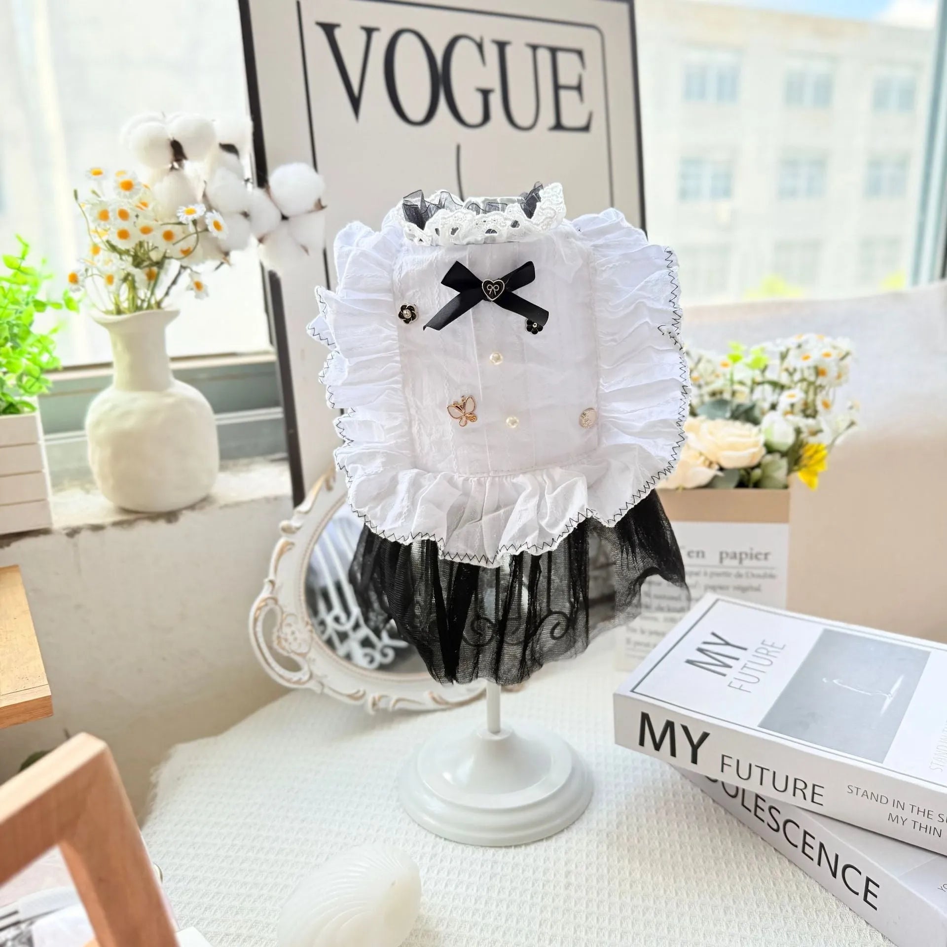 White polyester waltz gauze skirt dog clothing on a mannequin, showing princess style.