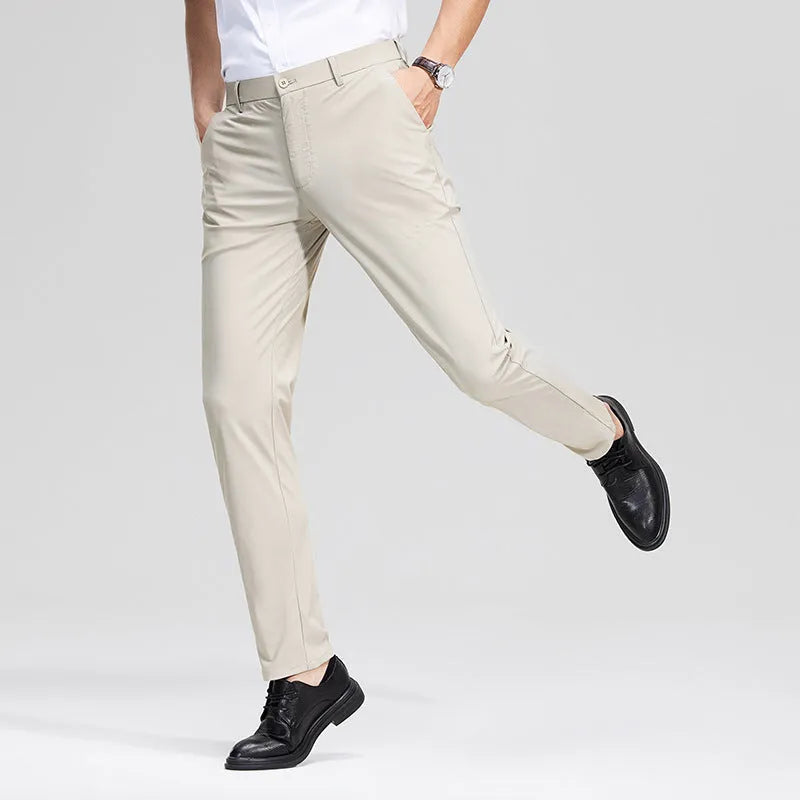 Pair of men's summer ice silk straight-leg suit trousers in solid colour on white background