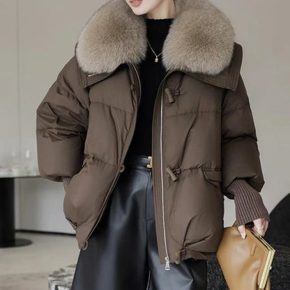Women's winter down jacket with elegant fur collar available in brown, black, and white.