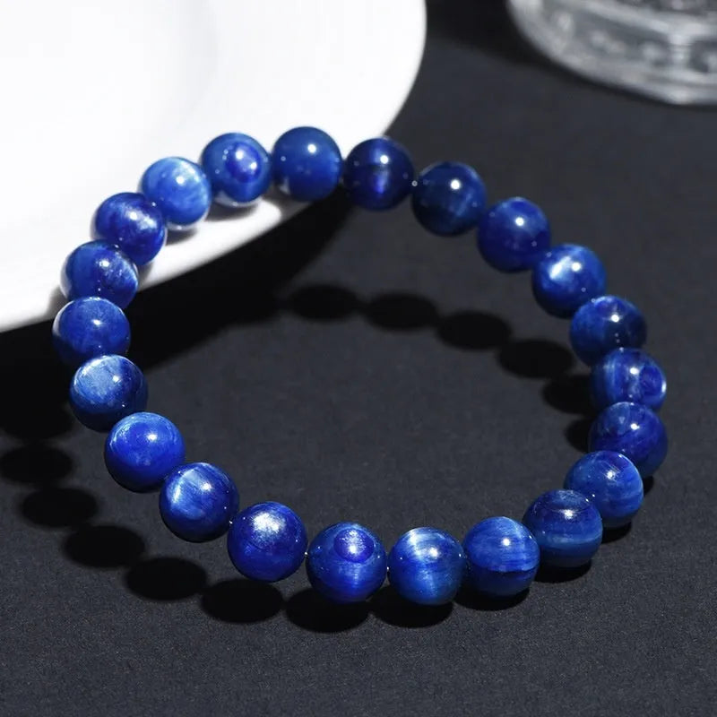 Natural blue crystal ball bracelet with geometric ruyi symbol design in polished 7A grade crystal