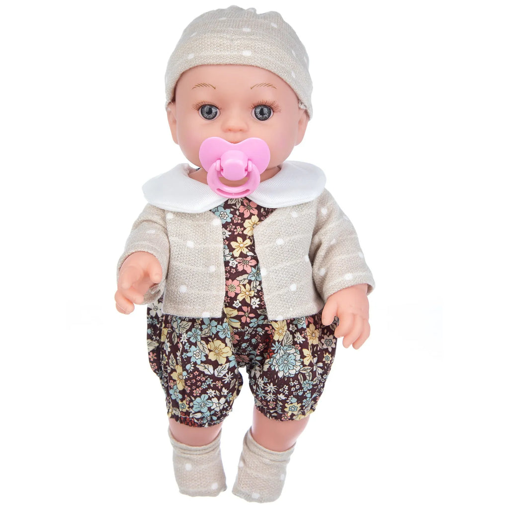 Full vinyl baby doll 30cm with changeable clothes suit in TM-010 colour option, standing on a plain background
