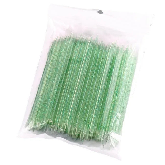 Nail glue sticks 100pcs in assorted colours including pink, blue, green, and purple, 7.5cm and 9.3cm lengths