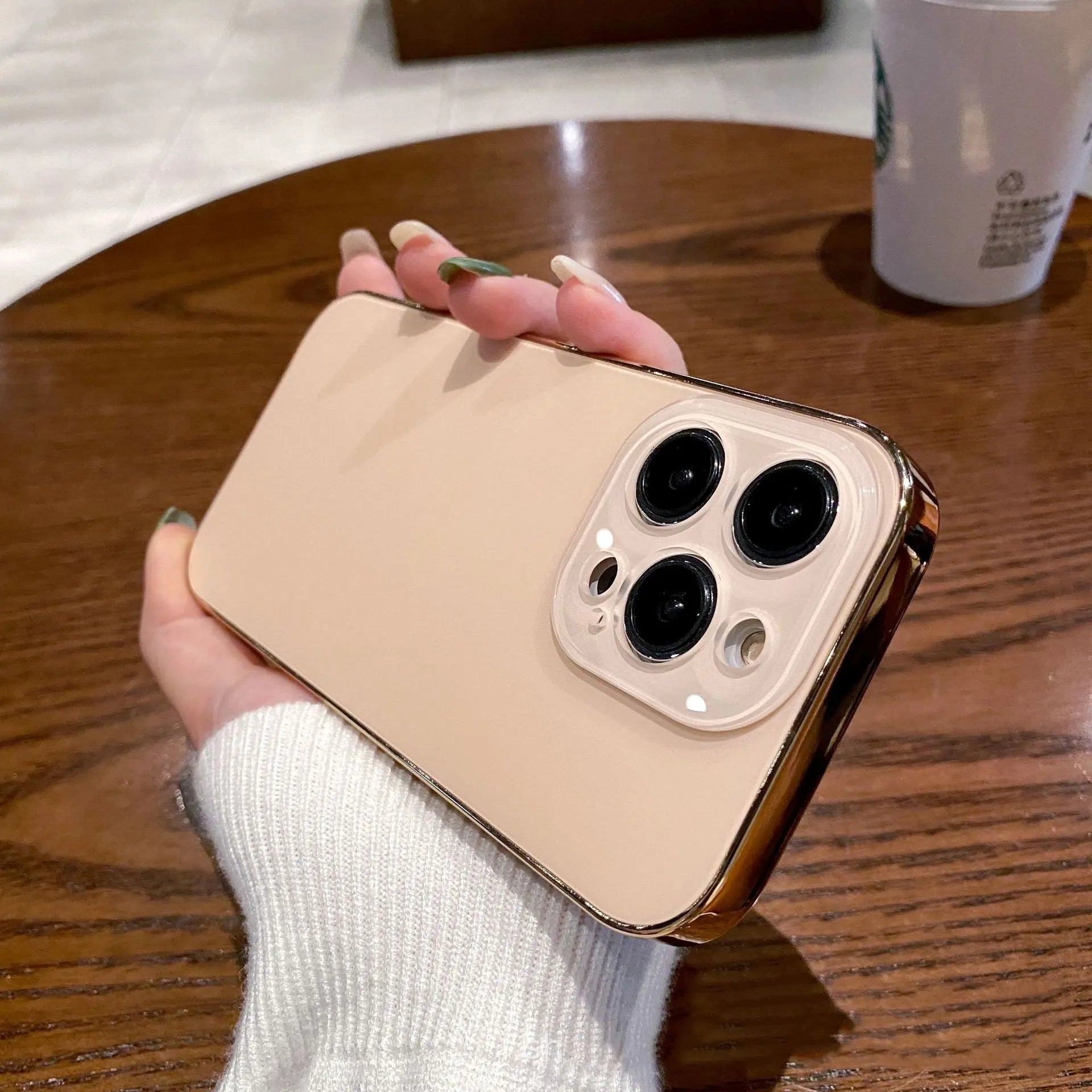 Electroplated TPU frosted acrylic phone case with matte finish for iPhone 11-14 series, showing black front and back against a neutral background