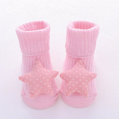 Cotton baby socks in various designs for newborns to 3-month-olds