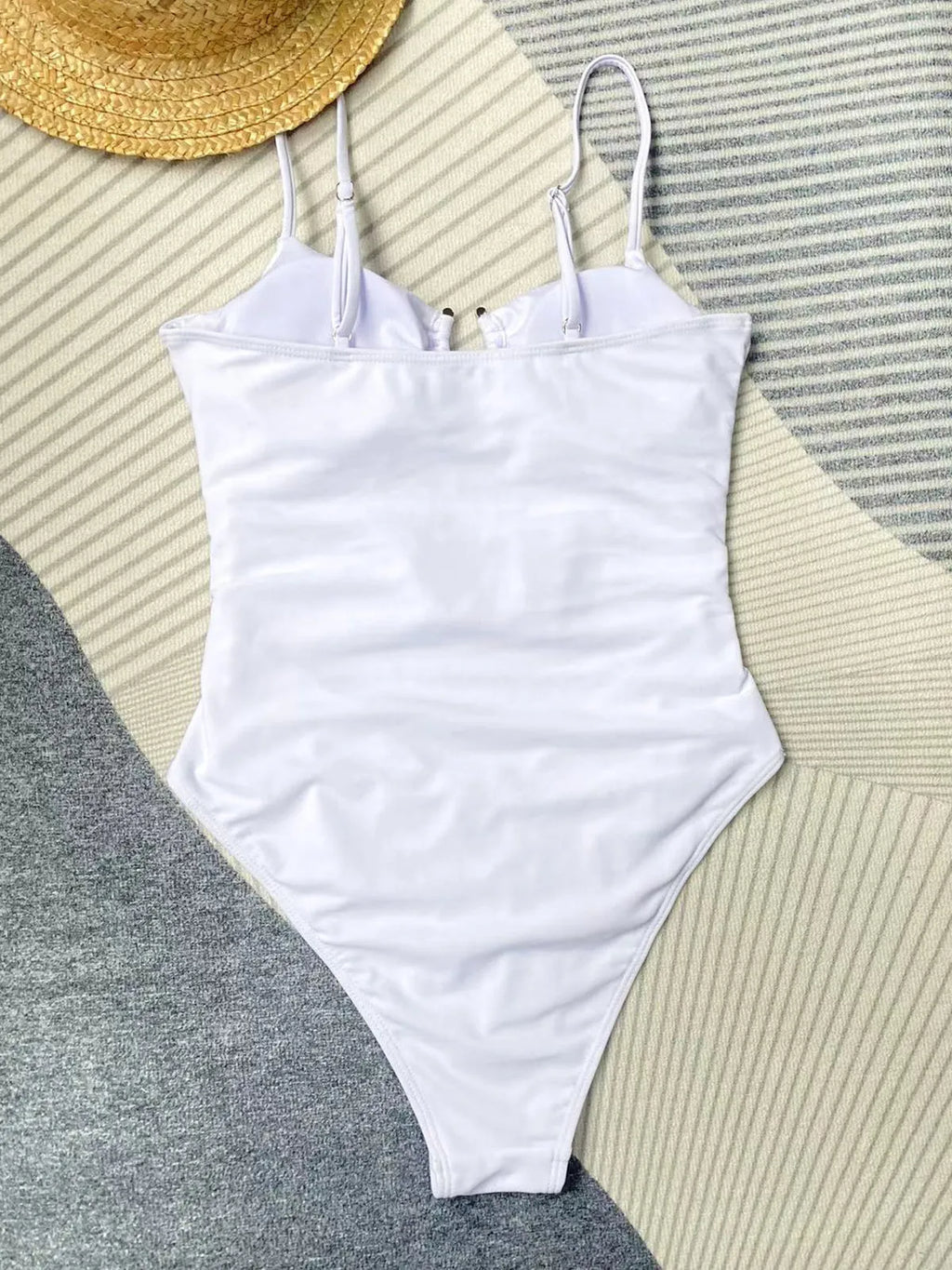 Women's black solid colour one-piece swimsuit with bikini style and tight fit