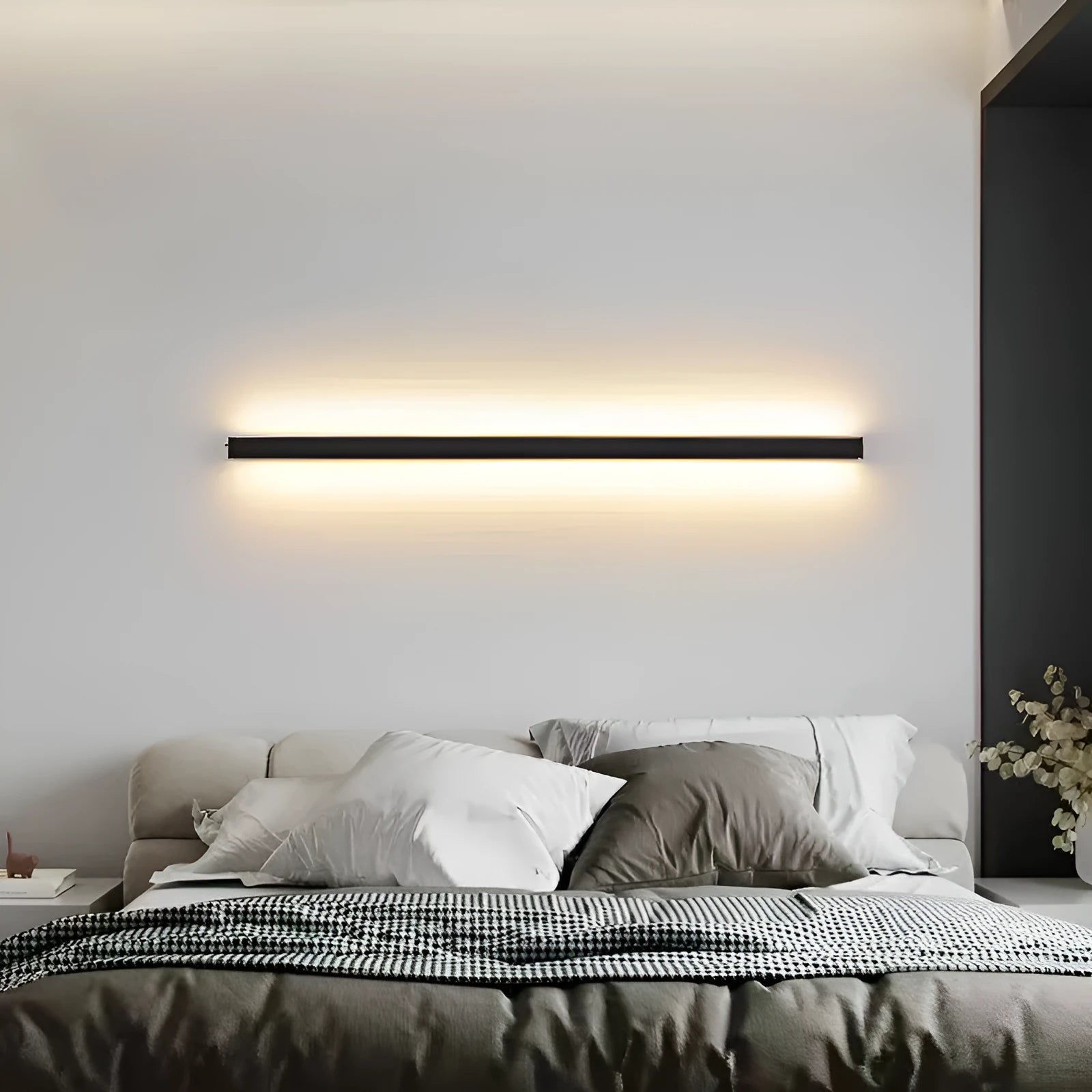 80cm long black aluminium LED strip wall light with a polycarbonate shade and touch control for colour changing.