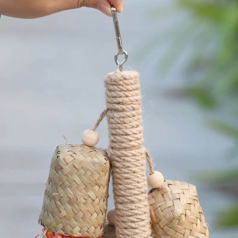 Colourful shredded paper parrot biting toy with wood beads and sisal rope, measuring 15 by 35 cm