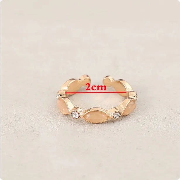 Oval gemstone inlaid alloy open adjustable ring for women in gold colour
