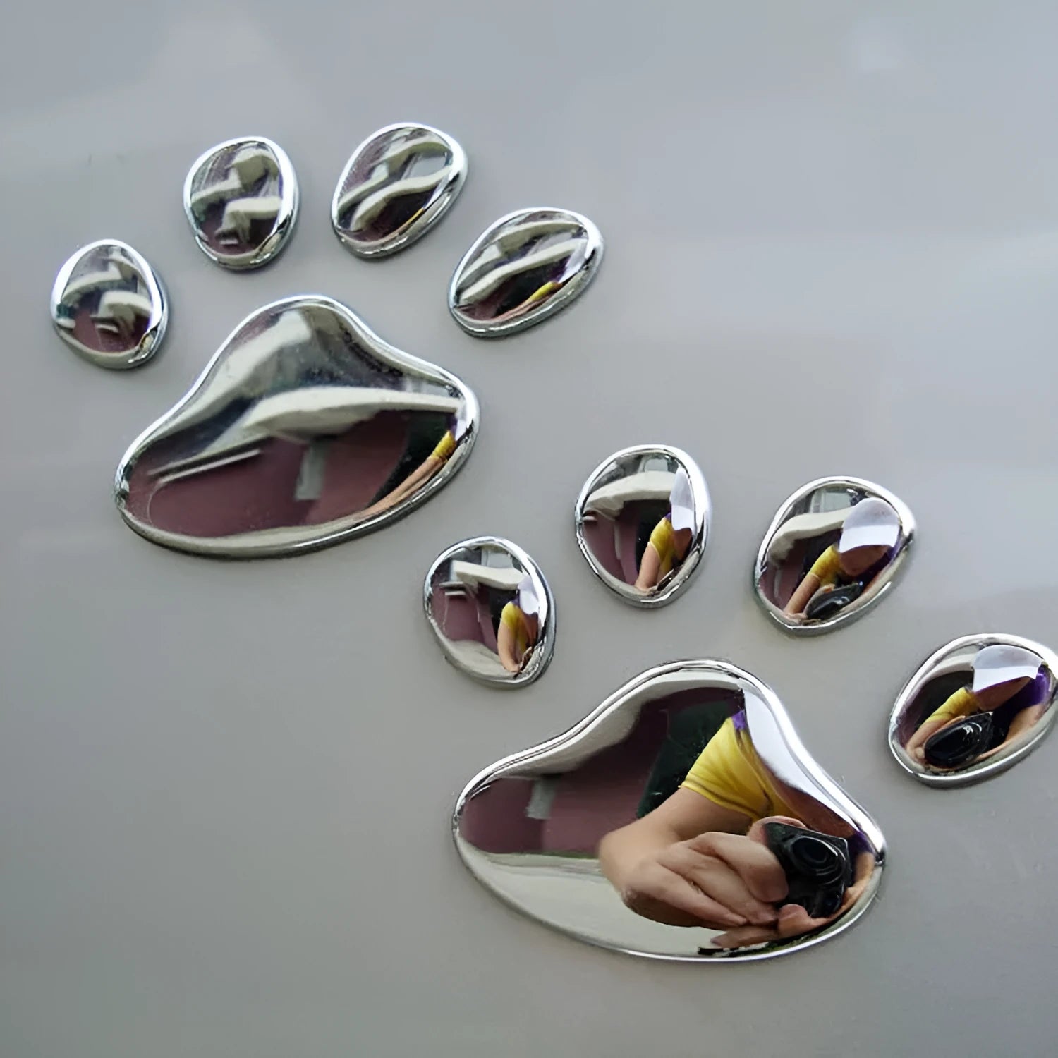 PVC car sticker with hand-shaped dog footprints design in multiple colours for vehicle bumpers