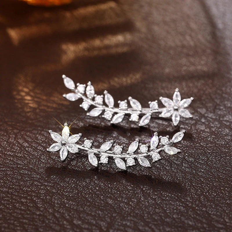 Floral diamond earrings for women in white gold, gold, and rose gold finishes