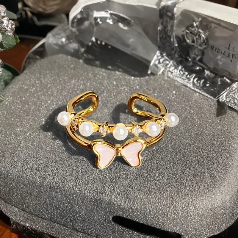 Adjustable copper ring with a vintage gourd, flower, and bow design in a new Chinese style.